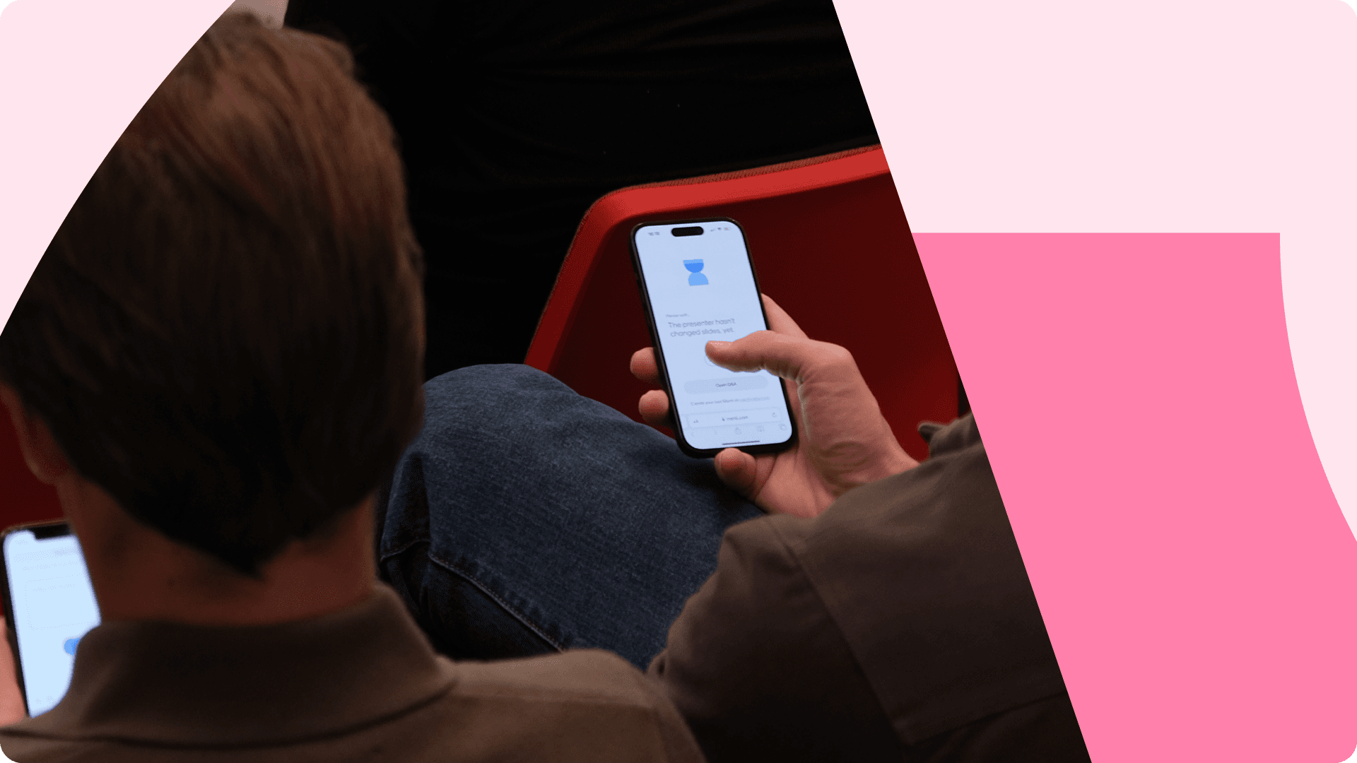 Image of a person using Mentimeter on their phone
