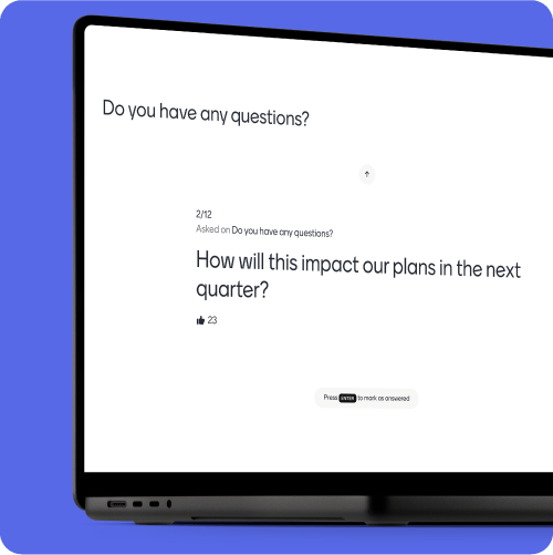 A graphic showing laptop screen showing an Q&A slide in Mentimeter.