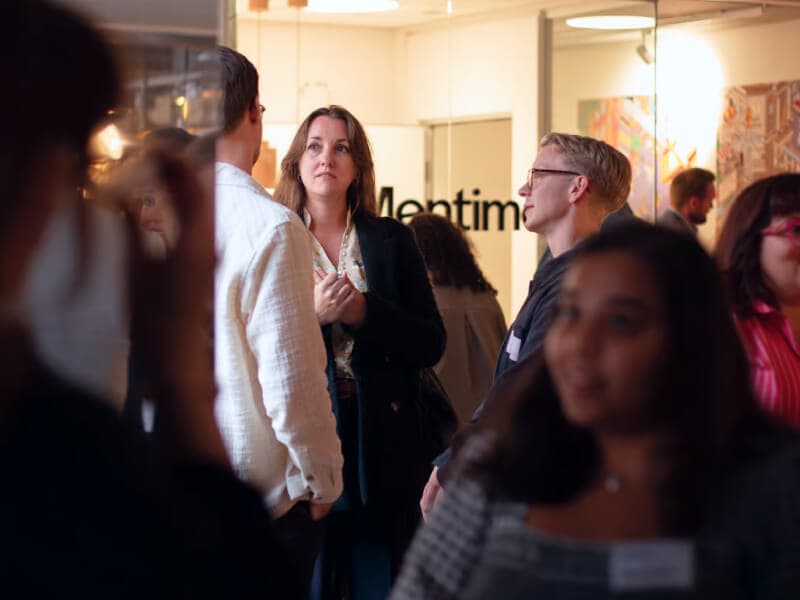 People meeting at a Mentimeter event