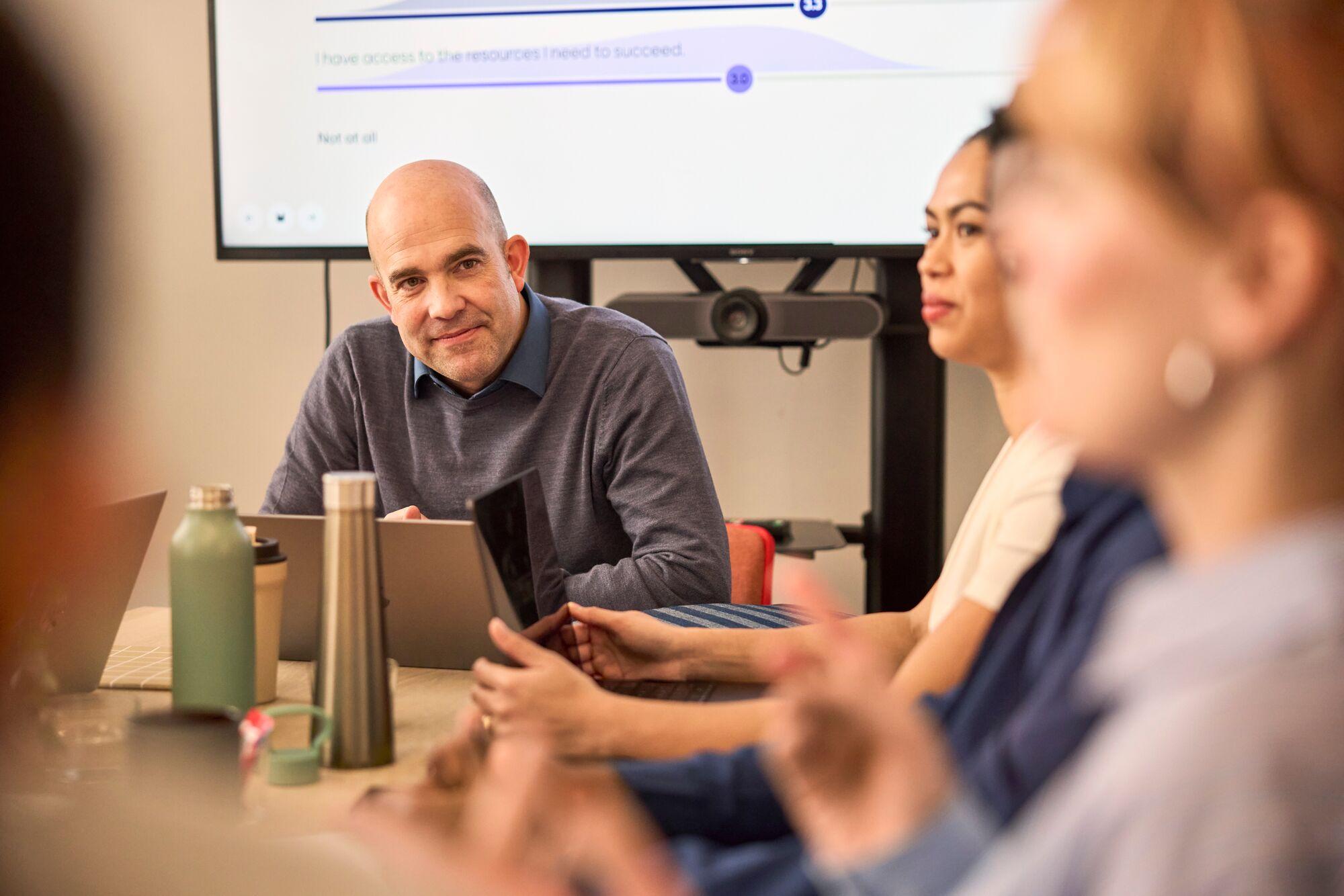 Faculty and students in a collaborative classroom discussion