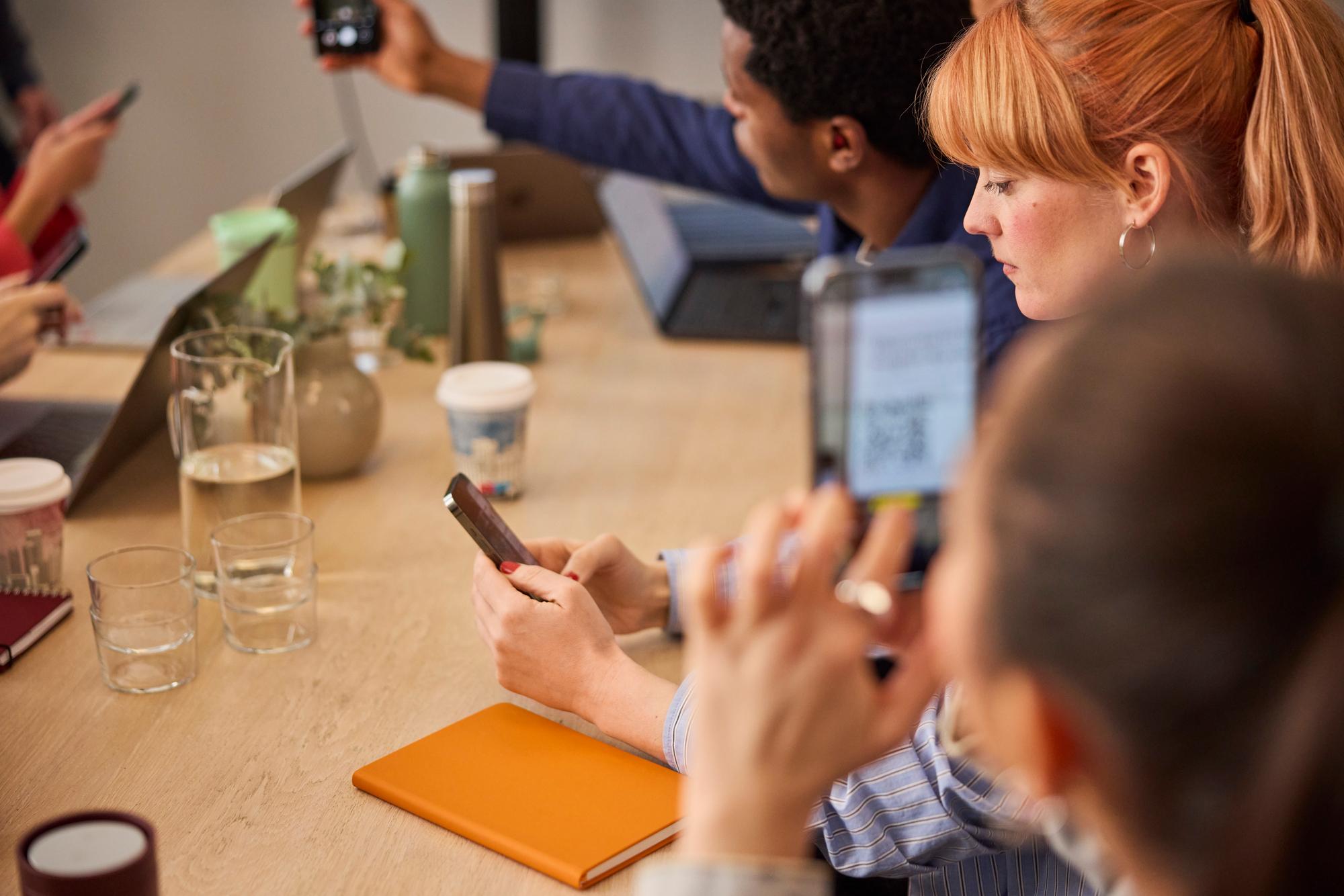Students engaging with digital tools in a classroom setting