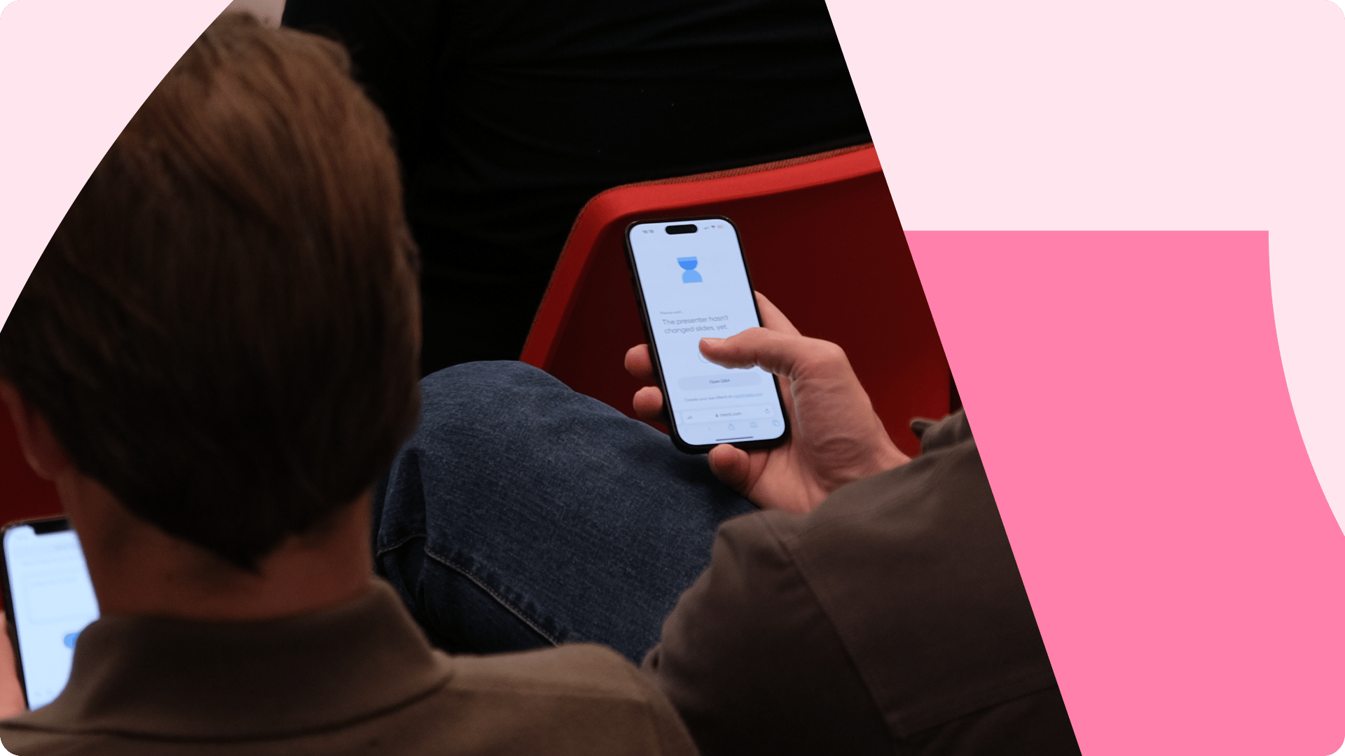 Image of a person using Mentimeter on their phone
